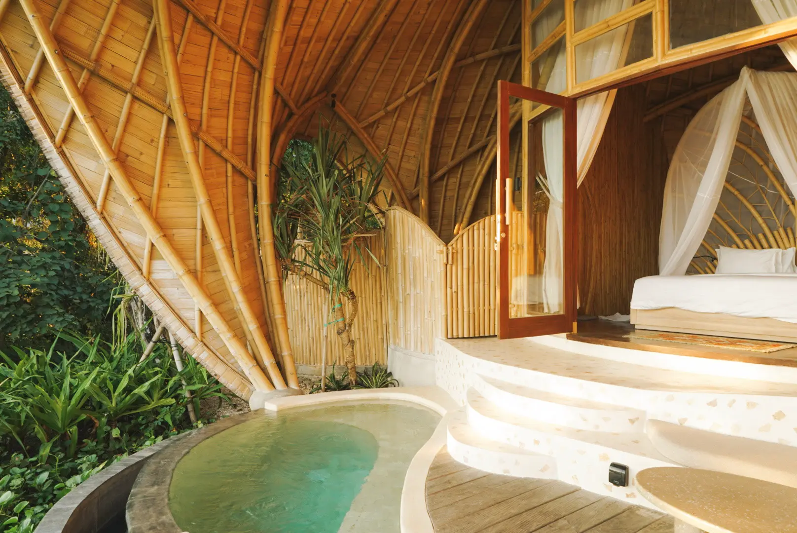 Eco Bamboo Beach Front Lodge deck with panoramic Indian Ocean and jungle views — Kini Resort Sumbawa Indonesia